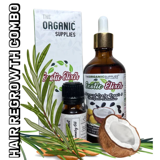An image featuring a hair regrowth combo with two glass bottles. The first bottle is 'Exotic Elixir Hair Serum,' and the second is 'Rosemary Oil.' The bottles are surrounded by natural ingredients, including argan, coconuts, rosemary leaves, almonds, black seeds, emphasizing the revitalizing components of the combo. The label on the side reads 'Hair Regrowth Combo,' against a white background. Additionally, an exotic elixir packing box is visible in the image.