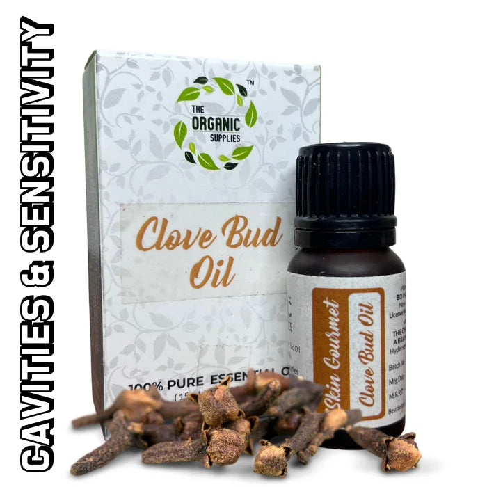 A 10ml bottle of The Organic Supplies 100% pure clove bud essential oil next to a box of dried clove buds. Clove bud oil is a natural remedy for lice, headaches, and toothache..